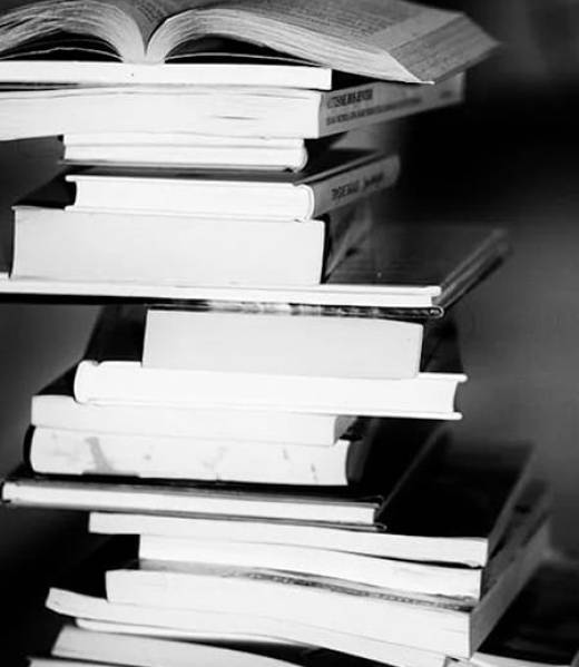 Books stacked on table